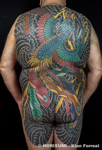 traditional back piece tattoo