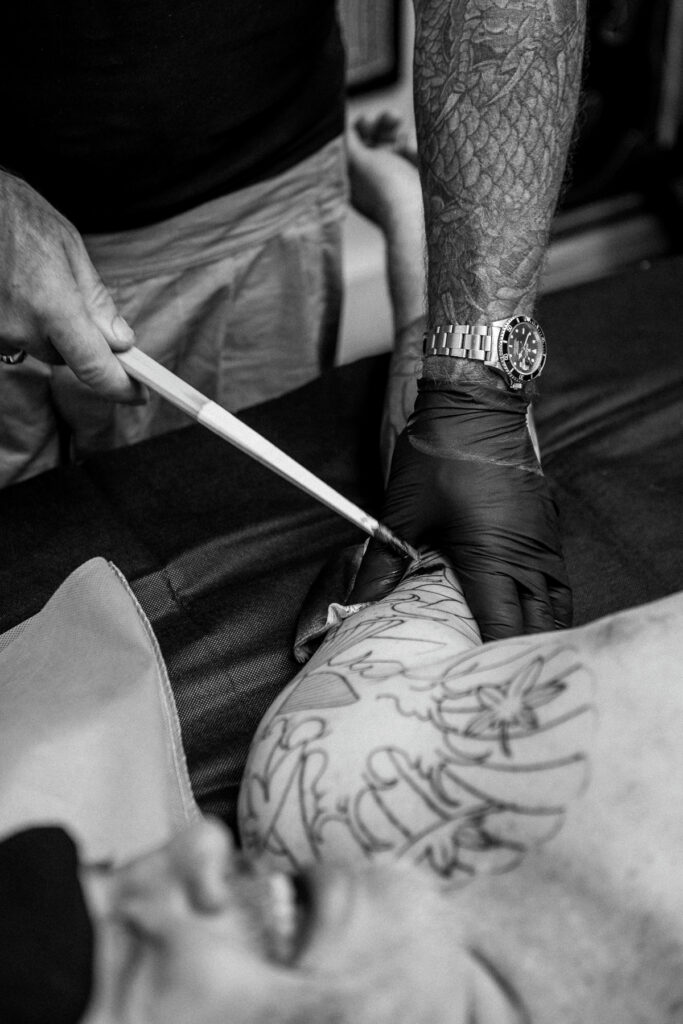 Choosing a Japanese Tattoo Artist in Sydney: What to Actually Look For 4 close up of horisumi doing tebori