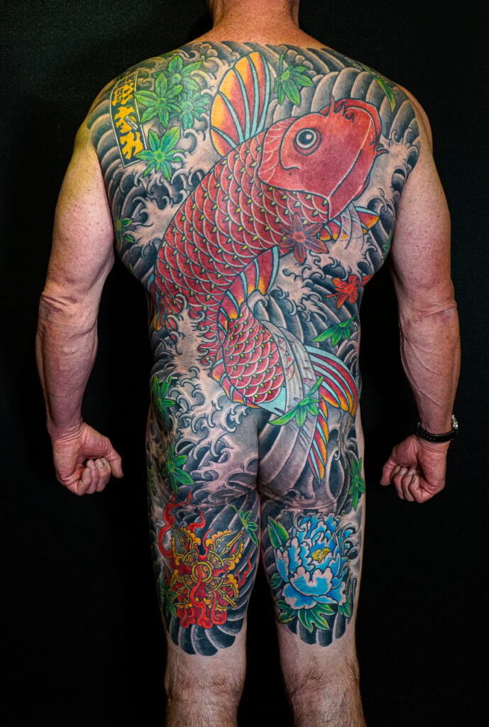 What Your Japanese Tattoo Actually Means — Koi, Dragon, Snake, Hannya 1 irezumi koi backpiece