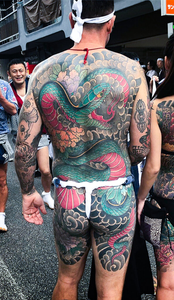 What Your Japanese Tattoo Actually Means — Koi, Dragon, Snake, Hannya 3 irezumi snake backpiece